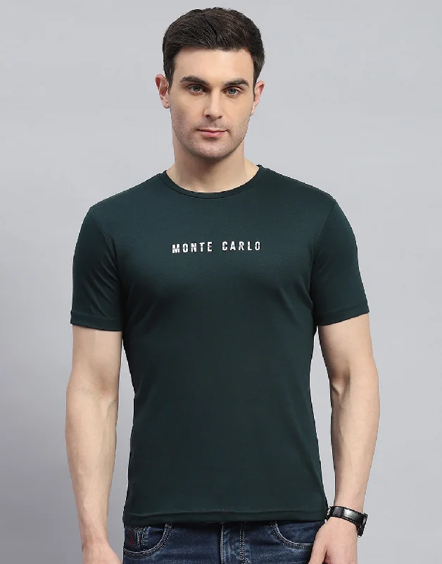 men’s printed short sleeve shirts with graphics -Men Green Solid Round Neck Half Sleeve T-Shirt